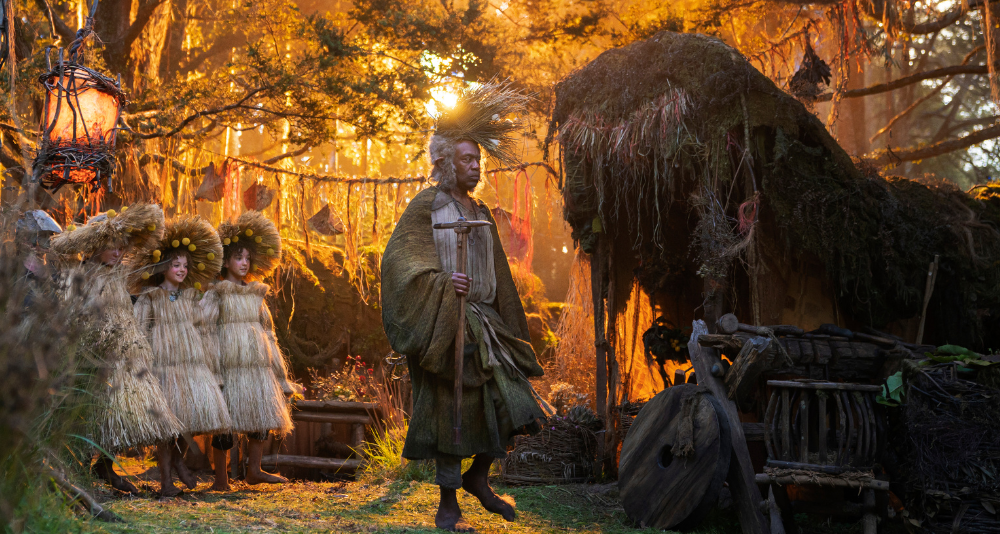 Lenny Henry as Sadoc Burrows and Beau Cassidy in The Lord of the Rings: The Rings of Power