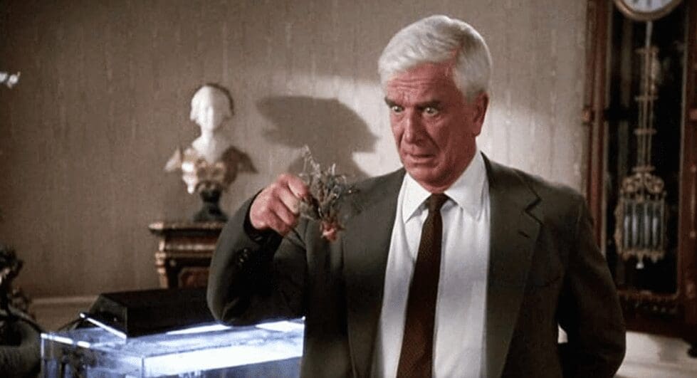 Leslie Nielsen in The Naked Gun: From the Files of Police Squad! (1988)