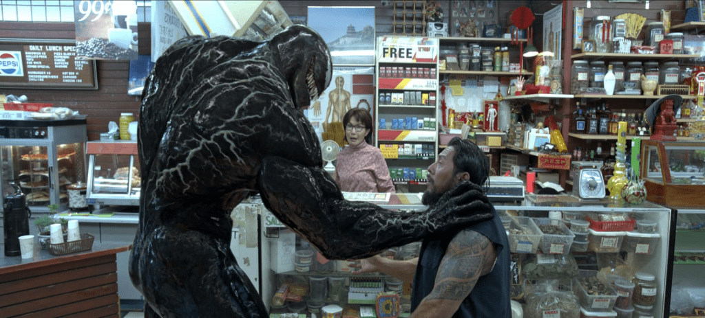 Tom Hardy, Peggy Lu, and Sam Medina in Venom (2018) screenshot