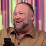 Alex Jones Smiling During An Episode of the Alex Jones Show on InfoWars